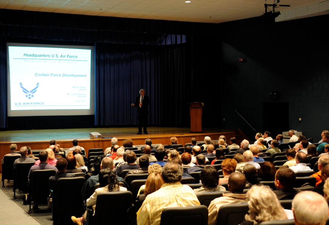 LANGLEY AIR FORCE BASE, Va. -Daniel Sitterly, Air Force Air Staff representative, conducts a civilian force development briefing April 9. The Vice Chief of Staff of the Air Force recently approved several new civilian force development programs and tools. The mass briefing took place to spread the word, and to market the new civilian force development initiatives to Air Combat Command's civilian workforce and military supervisors. (U.S. Air Force photo/ Senior Airman Dana Hill)