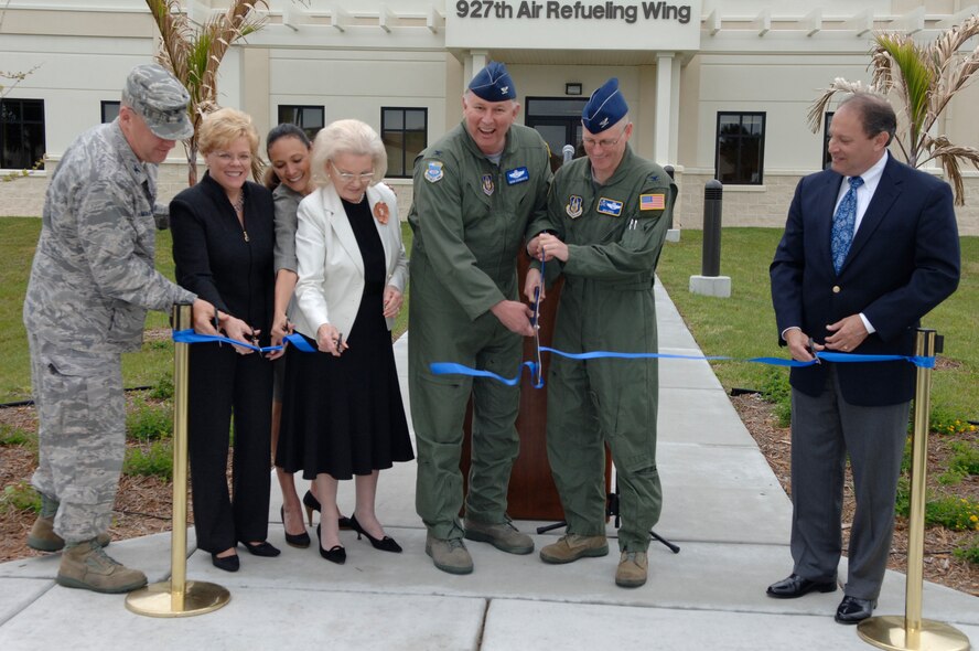 Colonel Martin, Mrs. Rhea Law, Mrs. Digna Alvarez, Mrs. Vivian Reeves, Colonel Douglas Schwartz, Colonel Lewis, and Mr. Mark Huey cut the ribbon during today's ceremony (U.S. Air Force Photo/Tech. Sgt. Denise Hauser)