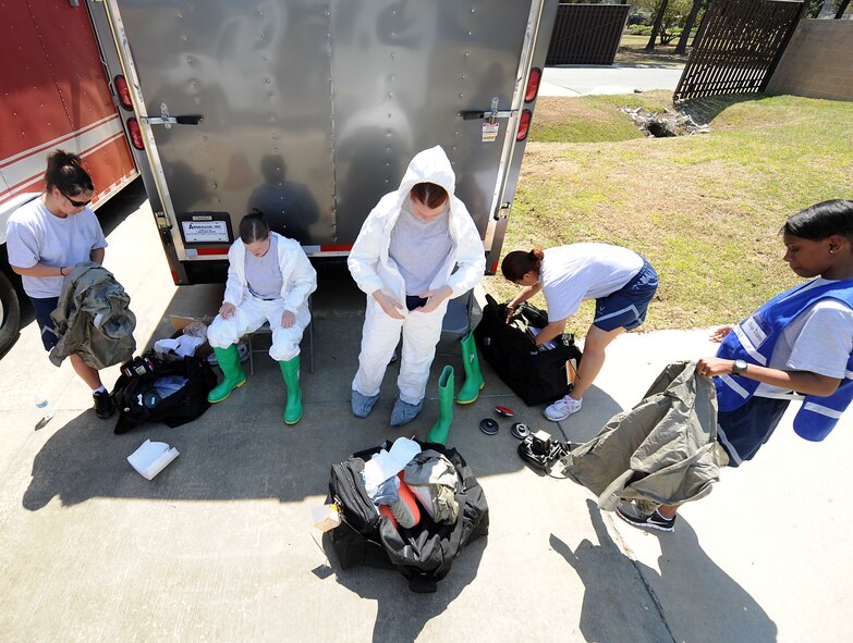MOODY AIR FORCE BASE, Ga. -- Airmen from the 23rd Aeromedical Dental Squadron and 23rd Civil Engineer Squadron prepare for the Air Combat Command Chemical, Biological, Radiological and Nuclear Challenge scenario here April 6. The scenario tested both squadrons’ ability to detect a potential chemical threat. (U.S. Air Force photo by Airman 1st Class Joshua Green/RELEASED)