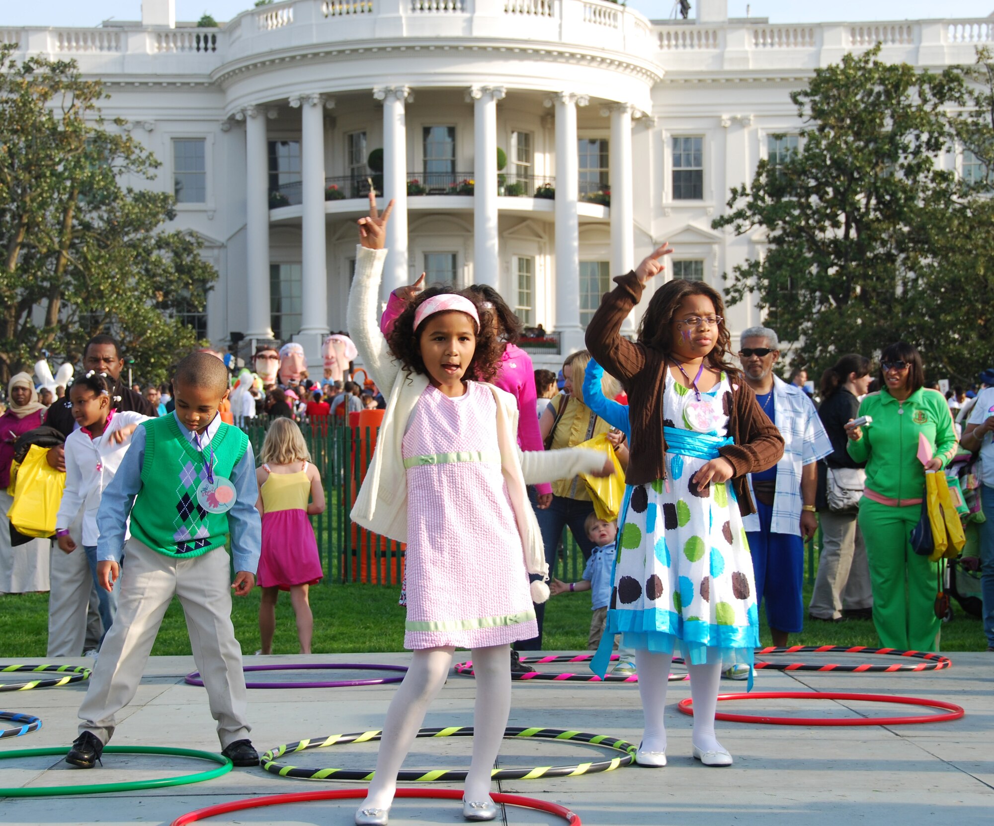 JOINT BASE MCGUIRE-DIX-LAKEHURST, N.J. - Jason and Mya Jeffries, children of Master Sgt. Donna Jeffries, of the 514th Air Mobility Wing, here, learn the "Peace Out" song at the "Hop To It" station April 5 during their visit to the White House for the annual Easter Egg Roll. The JB MDL dependents were two of 50 JB MDL members to participate in the event attended by 30,000 people.