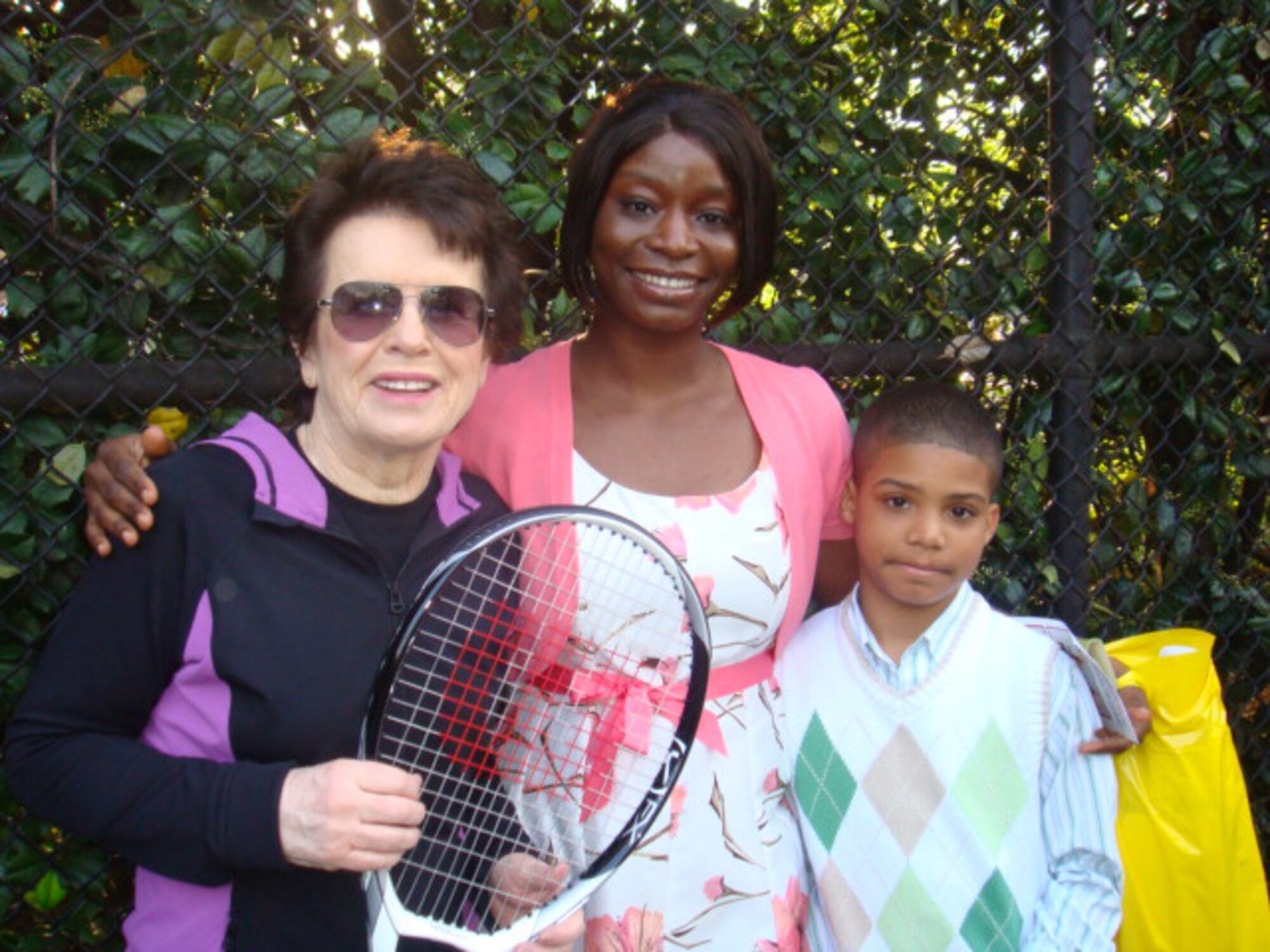 JOINT BASE MCGUIRE-DIX-LAKEHURST, N.J. - Staff Sgt. Nikkisha Mercado, middle, and her son, Gabriel, take a picture with tennis great Billie Jean King April 5, during their attendance at the White House Easer Egg Roll. Fiftey JB MDL members were selected to attend the annual event.  (U.S. Air Force photo)                         