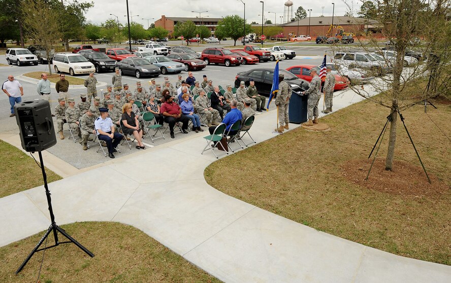 MOODY AIR FORCE BASE, Ga. -- Moody leadership, Airmen and civilians attend a ribbon cutting ceremony celebrating the completion of a new base dormitory here April 8. The new dorm will house up to 120 unaccompanied Airmen. (U.S. Air Force photo by Airman Class Joshua Green)
