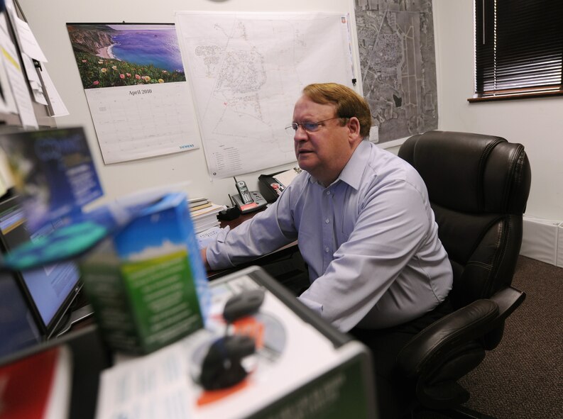 MOODY AIR FORCE BASE, Ga. -- Don Montgomery, 23rd Civil Engineer Squadron base energy manager, views energy consumption using the Energy Monitoring and Control System here April 8. This system allows Mr. Montgomery to monitor a majority of Moody facilities and determine which building is using the most energy. (U.S. Air Force photo by Airman 1st Class Benjamin Wiseman/RELEASED)