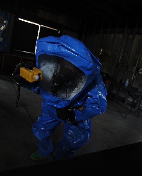 MOODY AIR FORCE BASE, Ga. -- Airman 1st Class Jennifer Forsythe, 23rd Aeromedical Dental Squadron bioenvironmental journeyman, takes radiological and oxygen readings from a room during the Air Combat Command Chemical, Biological, Radiological and Nuclear Challenge here April 7. Airman Forsythe metered the room to ensure there were no hazardous vapors remaining. (U.S. Air Force photo by Airman 1st Class Benjamin Wiseman/RELEASED)