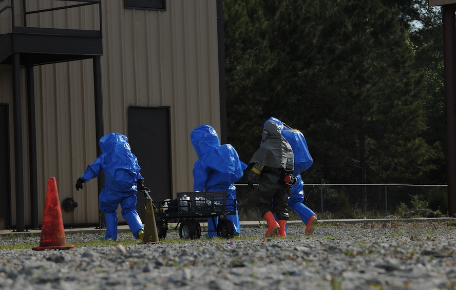 MOODY AIR FORCE BASE, Ga. -- A chemical, biological, radiological and nuclear first response team enters a building during the Air Combat Command CBRN Challenge scenario here April 7. The challenge is held annually and is used to train first responders for real world situations. (U.S. Air Force photo by Airman 1st Class Benjamin Wiseman/RELEASED)