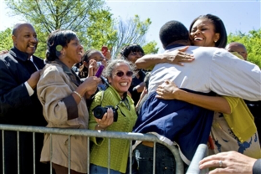 First Lady Michelle Obama hugs a Pentagon employee during a visit to thank both the military members and the civilian employees of the Department of Defense for their service, April 9, 2010.  