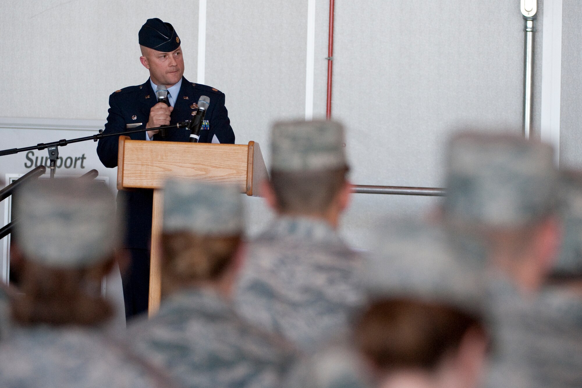 HOLLOMAN AIR FORCE BASE, N.M. -- Maj. William Magee, 44th Aircraft Maintenance Squadron commander, addresses Holloman Airmen during the 44th Fighter Group's formal activation ceremony April 9, 2010. The 44th Fighter Group traces its lineage to the famed World War II 44th Bombardment Group (Heavy) originally activated in January 1941 at MacDill Army Air Field in Tampa, Fla., and flew the then state of the art B-24 Liberator. Sixty-nine years later, the 44th Fighter Group is the only Air Force Reserve organization to be selected to fly the U.S. Air Force's premier air superiority fighter, the F-22 Raptor. (U.S. Air Force photo by Staff Sgt. Joe Laws / Released)