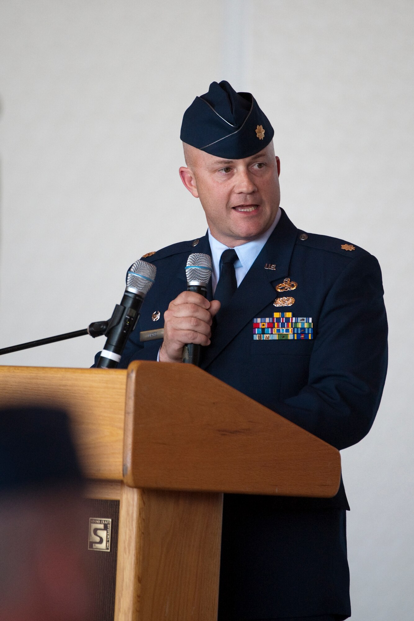 HOLLOMAN AIR FORCE BASE, N.M. -- Maj. William Magee, 44th Aircraft Maintenance Squadron commander, addresses Holloman Airmen during the 44th Fighter Group's formal activation ceremony April 9, 2010. The 44th Fighter Group traces its lineage to the famed World War II 44th Bombardment Group (Heavy) originally activated in January 1941 at MacDill Army Air Field in Tampa, Fla., and flew the then state of the art B-24 Liberator. Sixty-nine years later, the 44th Fighter Group is the only Air Force Reserve organization to be selected to fly the U.S. Air Force's premier air superiority fighter, the F-22 Raptor. (U.S. Air Force photo by Staff Sgt. Joe Laws / Released)