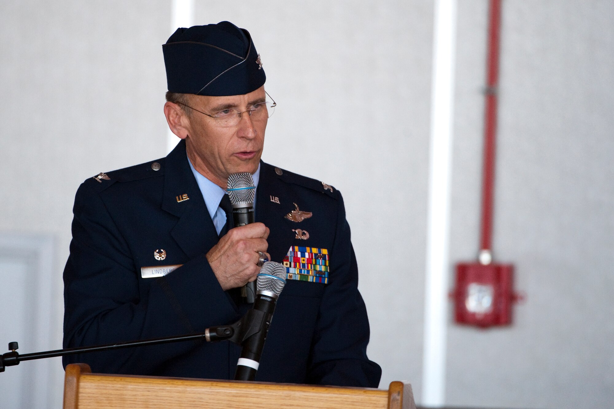HOLLOMAN AIR FORCE BASE, N.M. -- Col. Donald Lindberg, 44th Fighter Group commander, addresses Holloman Airmen during the group's activation ceremony April 9, 2010. The 44th Fighter Group traces its lineage to the famed World War II 44th Bombardment Group (Heavy) originally activated in January 1941 at MacDill Army Air Field in Tampa, Fla., and flew the then state of the art B-24 Liberator. Sixty-nine years later, the 44th Fighter Group is the only Air Force Reserve organization to be selected to fly the U.S. Air Force's premier air superiority fighter, the F-22 Raptor. (U.S. Air Force photo by Staff Sgt. Joe Laws / Released)