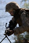 A Marine from 2nd Battalion, 25th Marine Regiment, 4th Marine Division, Marine Forces Reserve, practices combat rushing during a field exercise in Quantico, Va., April 10.
