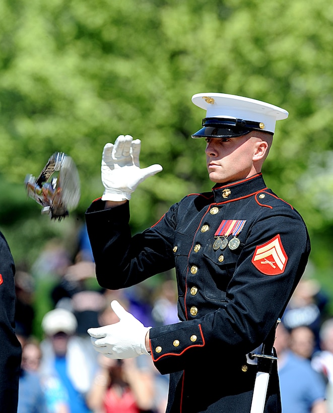 Cpl. Jonathan Zimmer, a member of the Silent Drill Platoon, spins his rifle during the inspection at the  U.S. Armed Forces Joint Ceremonial Drill Competition at the Licoln Memorial April 10. The Joint Drill Competition featured ceremonial drill units from each of the armed services.