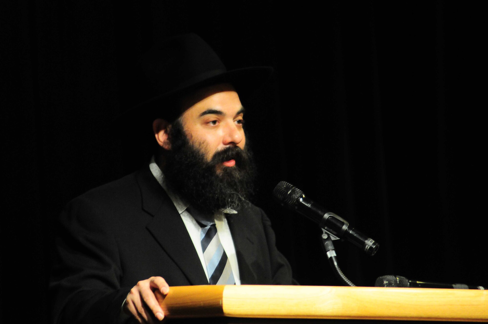 YOKOTA AIR BASE, Japan -- Rabbi Menachem Mendel Sudakevich, guest speaker at the Holocaust Days of Remembrance luncheon March 7, expressed the importance of using the unfortunate events of the past to improve the future.  The 2010 Holocaust Days of Remembrance Luncheon highlighted the strength and perseverance of the survivors while paying tribute to the victims of the Holocaust, as well as honoring the bravery of U.S. soldiers who helped defeat Nazi Germany and liberated Holocaust survivors. (U.S. Air Force photo/Airman 1st Class Devin Doskey)