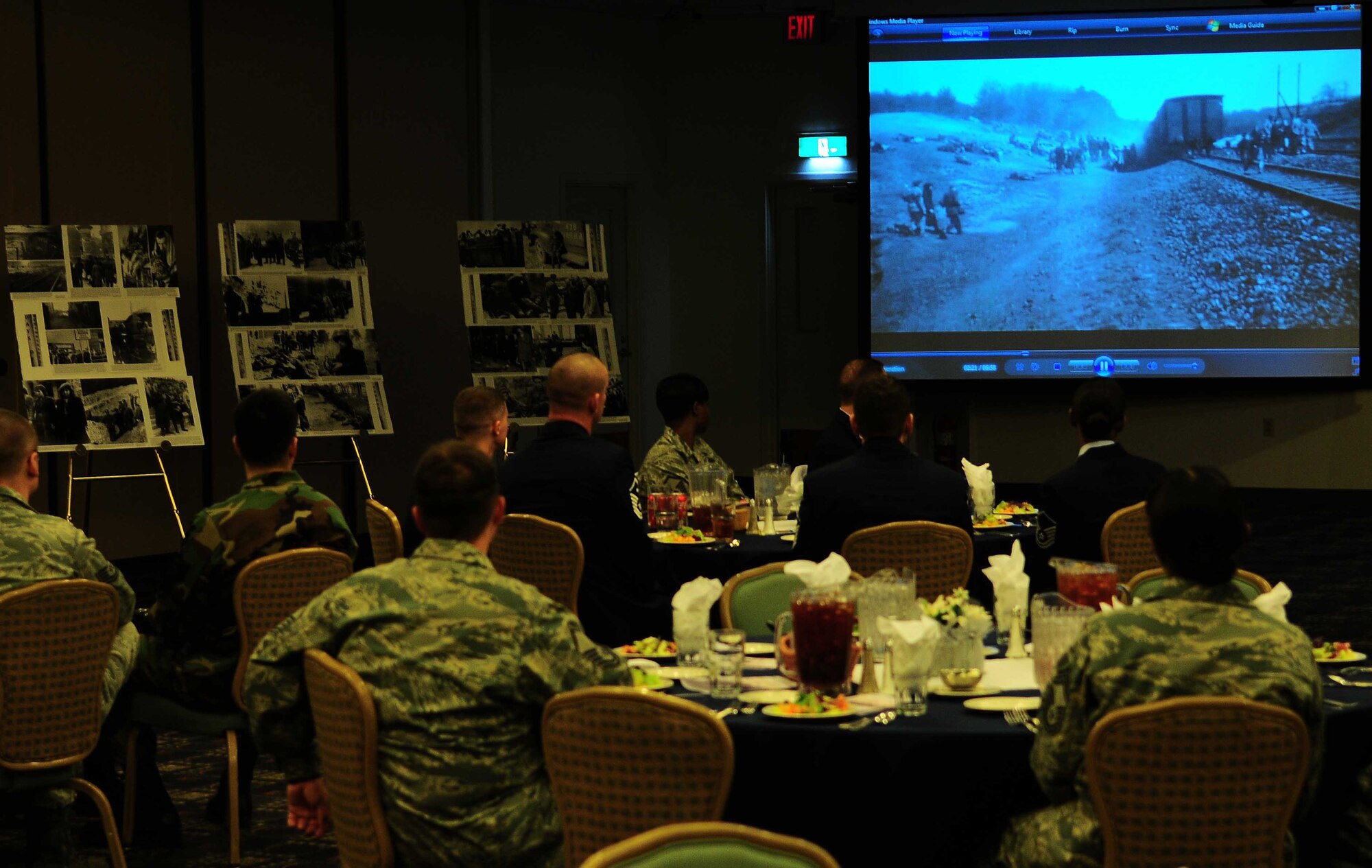 YOKOTA AIR BASE, Japan --The Holocaust Days of Remembrance committee showed a video March 7, from the U.S. Holocaust Memorial Museum. The 2010 Holocaust Days of Remembrance Luncheon highlighted the strength and perseverance of the survivors while paying tribute to the victims of the Holocaust, as well as honoring the bravery of U.S. soldiers who helped defeat Nazi Germany and liberated Holocaust survivors. (U.S. Air Force photo/Airman 1st Class Devin Doskey)
