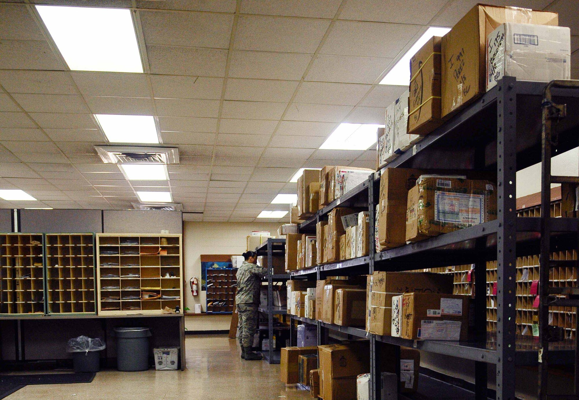 ANDERSEN AIR FORCE BASE, Guam ? Tech. Sgt. Sarah Stewart distributes daily mail here on April 9, 2010. Sergeant Stewart plays a key role in delivering more than 1 million pounds of mail per year to members of the Andersen team. (U.S. Air force photo by Airman 1st Class Jeffrey Schultze)