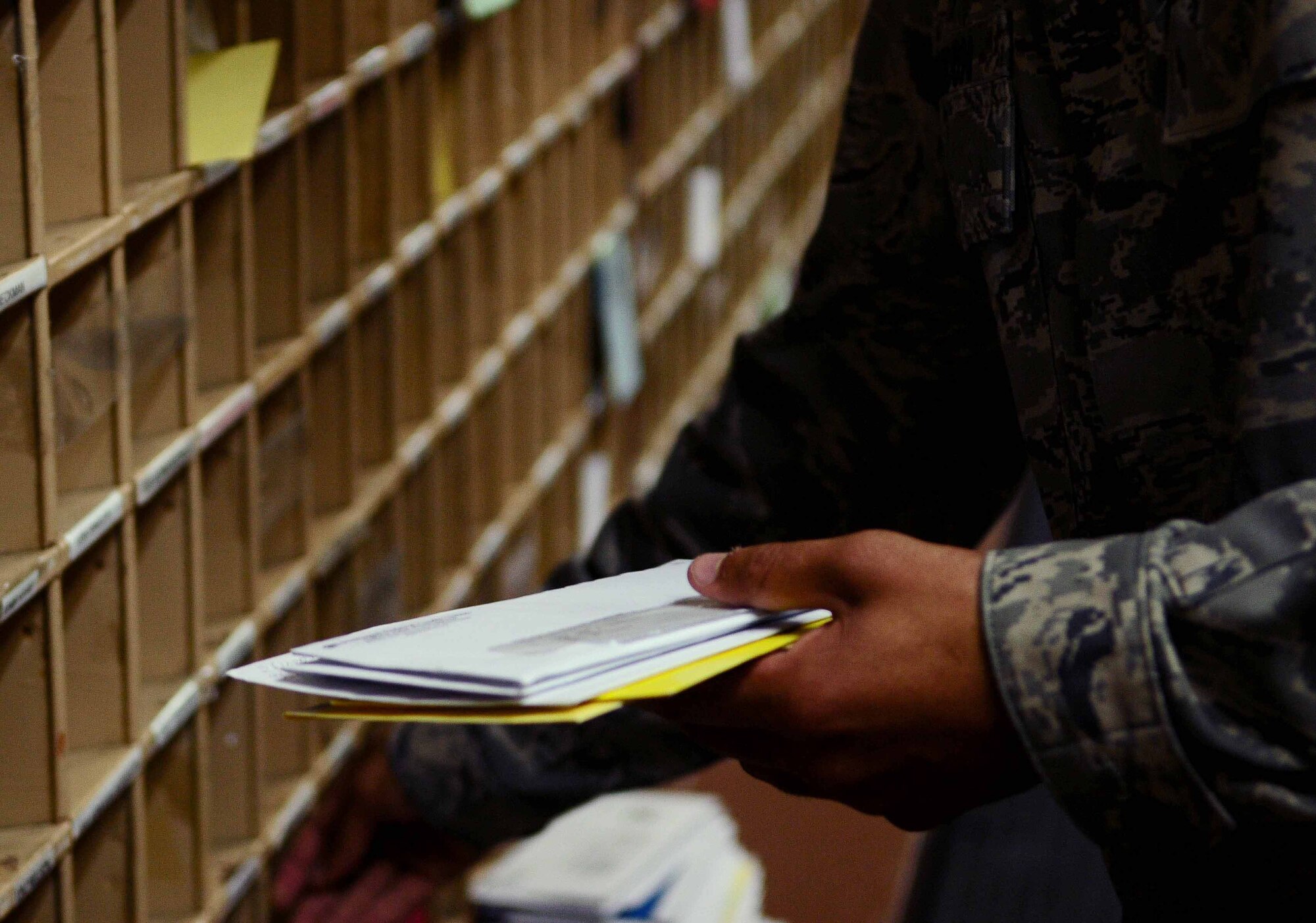 ANDERSEN AIR FORCE BASE, Guam ? Senior Airman Brandon Gordon distributes daily mail here on April 9, 2010. Airman Gordon plays a key role in delivering more than 1 million pounds of mail per year to members of the Andersen team. (U.S. Air force photo by Airman 1st Class Jeffrey Schultze)