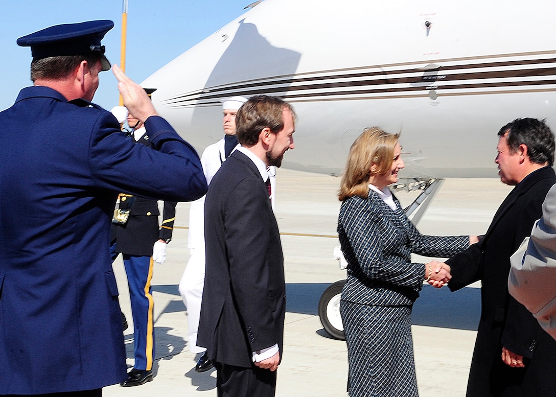 King of the Hashemite Kingdom of Jordan Abdullah II bin al Hussein is greeted by the Assistant Chief of Protocol for Diplomatic Affairs for the U.S. State Department, Gladys Boluda, and Col. Lee dePalo, 316th Wing/Joint Base Andrews vice commander, on the flight line at Joint Base Andrews, Md., April 10, 2010. The delegate landed at Andrews on his way to the Nuclear Security Summit hosted by President Barack Obama in Washington,  D.C., which slated for Monday and Tuesday. The 316th Wing is leading operations to provide safe, effective, and efficient arrival and departure services for the invited guests transiting Andrews. (U.S. Air Force photo by Staff Sergeant Keyonna Fennell).
