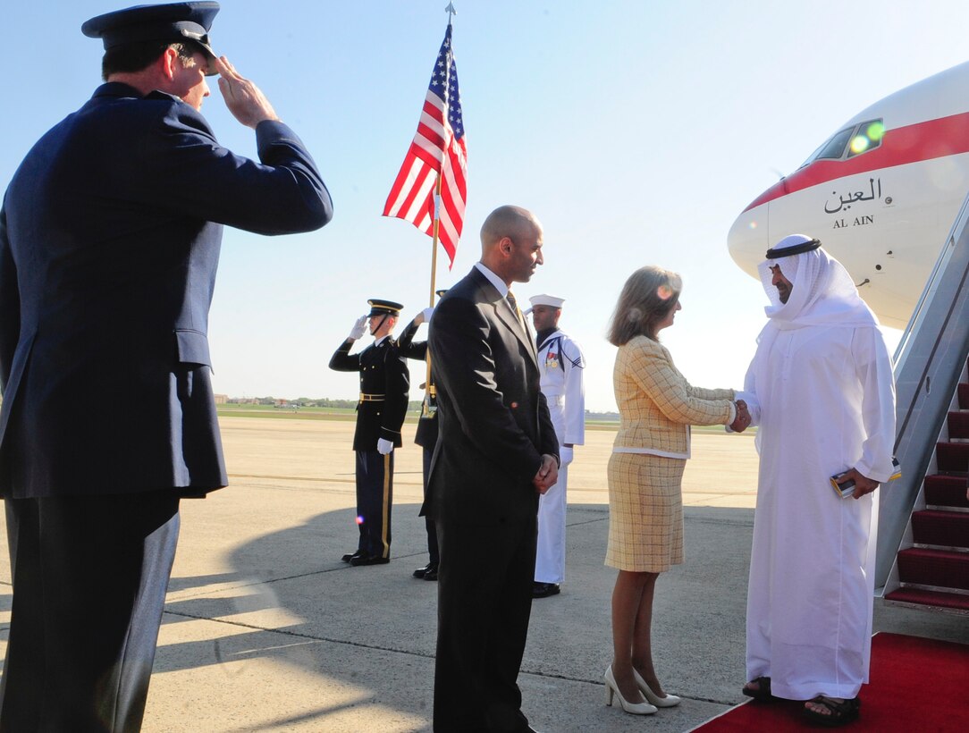 Sheikh Khalifa bin Zayed Al Nahyan, President of United Arab Emirates, is greeted by the Assistant Chief of Protocol for Diplomatic Affairs for the U.S. State Department, Gladys Boluda, and Col. Lee dePalo, 316th Wing/Joint Base Andrews vice commander, on the flight line at Joint Base Andrews, Md., April 11, 2010. The national delegate landed at Andrews on his way to the Nuclear Security Summit hosted by President Barack Obama in Washington, D.C., which is slated for Monday and Tuesday. The 316th Wing is leading operations to provide safe, effective, and efficient arrival and departure services for the invited guests transiting Andrews. (U.S. Air Force photo by Staff Sergeant Keyonna Fennell).
