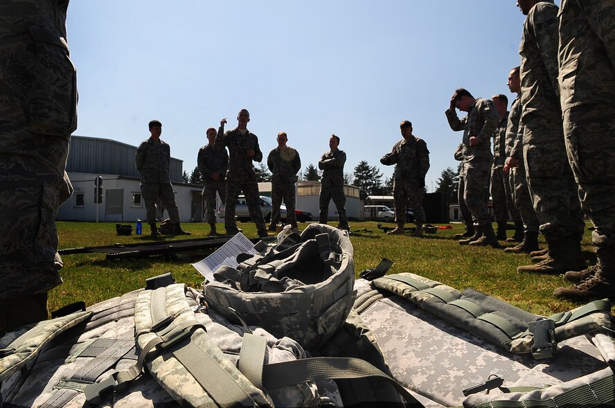 Tactical Air Control Party members from the 2nd and 4th Air Support Operations Squadron receive training on contingency aeromedical evacuation procedures from U.S. Army Sgt. Billy Raines (center), Charlie Company 1/214 Aviation Regiment flight medic, Grafenwoehr Army Airfield, Germany, April 7, 2010.The 2nd ASOS kicked off a 45 day pre-Afghanistan training plan, sharpening critical combat skills in preparation for upcoming Operation Enduring Freedom deployments. (U.S. Air Force photo by Senior Airman Tony R. Ritter)



