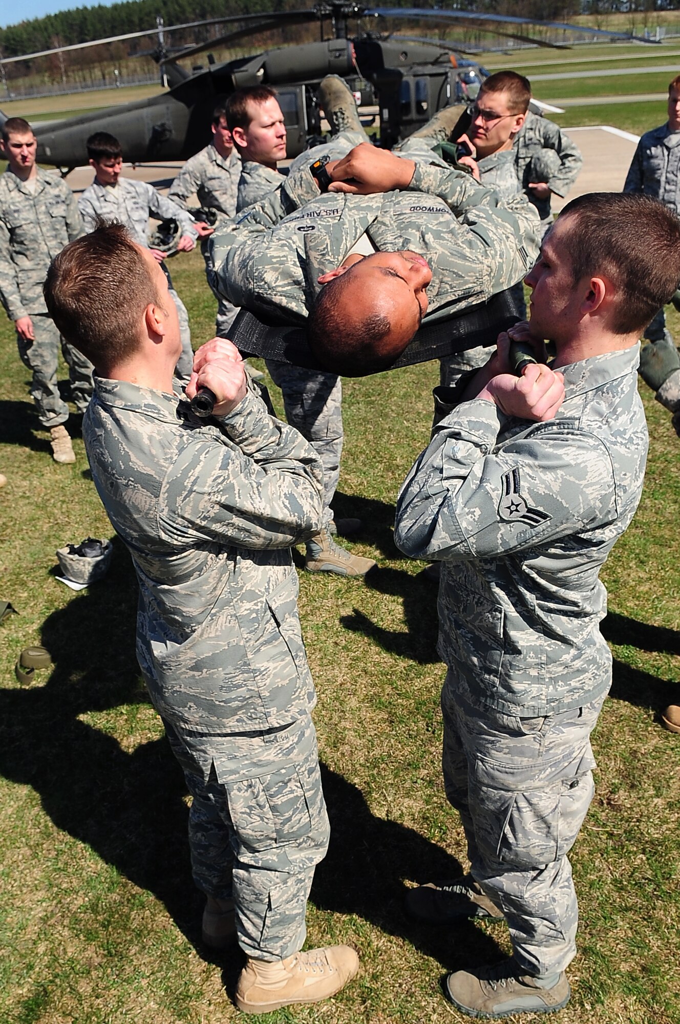 Tactical Air Control Party members from the 2nd and 4th Air Support Operations Squadron practice loading a patient on a UH-60 Blackhawk during training on contingency aeromedical evacuation procedures, Grafenwoehr Army Airfield, Germany, April 7, 2010.The 2nd ASOS kicked off a 45 day pre-Afghanistan training plan, sharpening critical combat skills in preparation for upcoming Operation Enduring Freedom deployments. (U.S. Air Force photo by Senior Airman Tony R. Ritter)




