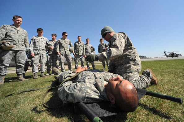 Tactical Air Control Party members from the 2nd and 4th Air Support Operations Squadron receive training on contingency aeromedical evacuation procedures from Army Sgt.Ronnie Rivas, Charlie Company 1/214 Aviation Regiment flight medic,
Grafenwoehr Army Airfield, Germany, April 7, 2010.The 2nd ASOS kicked off a 45 day pre-Afghanistan training plan, sharpening critical combat skills in preparation for upcoming Operation Enduring Freedom deployments. (U.S. Air Force photo by Senior Airman Tony R. Ritter)
