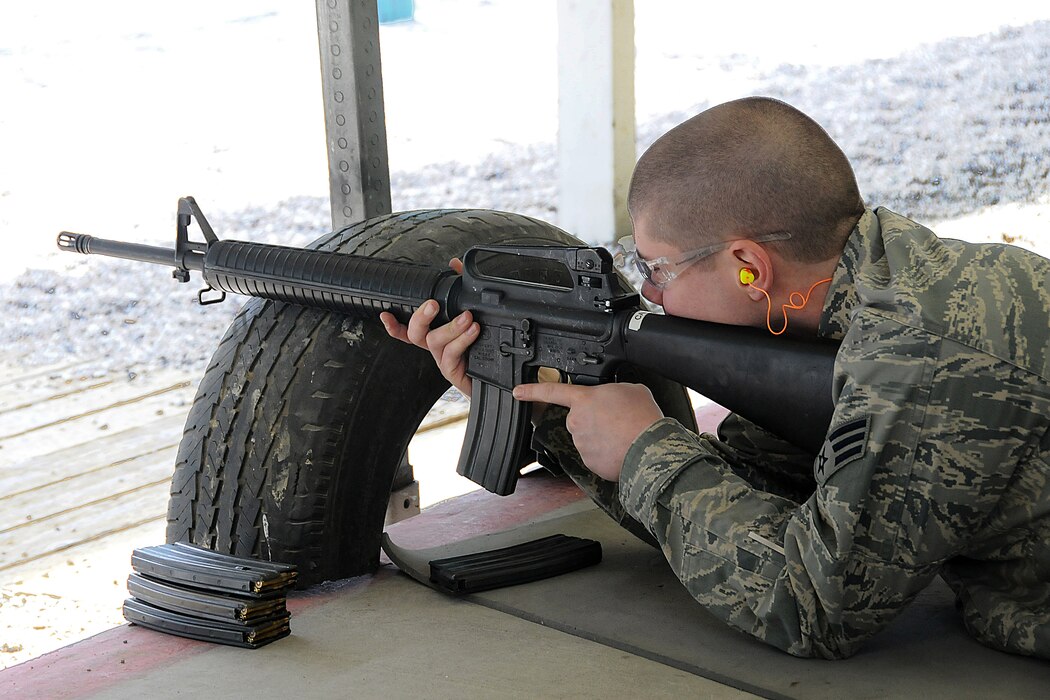 Senior Airman Bobby Foreman, 151st Civil Engineer Squadron, prepares to shoot his M-16 during weapons training on April 10. Airman Foreman is in the Combat Arms Training and Marksmanship class. (U.S. Air Force photo by Staff Sgt. Emily Monson)	