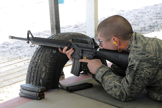 Senior Airman Bobby Foreman, 151st Civil Engineer Squadron, prepares to shoot his M-16 during weapons training on April 10. Airman Foreman is in the Combat Arms Training and Marksmanship class. (U.S. Air Force photo by Staff Sgt. Emily Monson)	