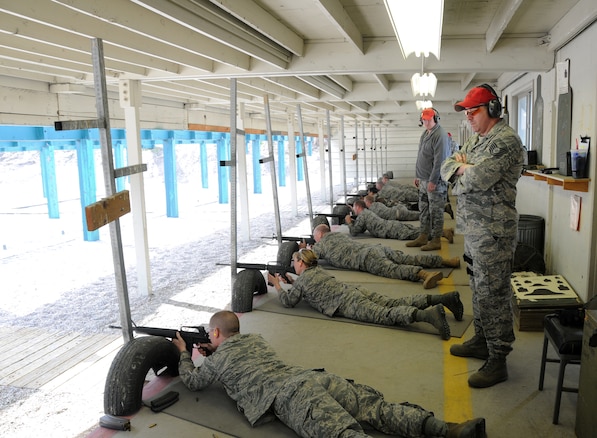 A group of Utah Air National Guard Airmen prepare for their qualifications in the Combat Arms Training and Marksmanship class on April 10.  Everyone is required to qualify for this class in order to be elligible to deploy.  (U.S. Air Force photo by Staff Sgt. Emily Monson)