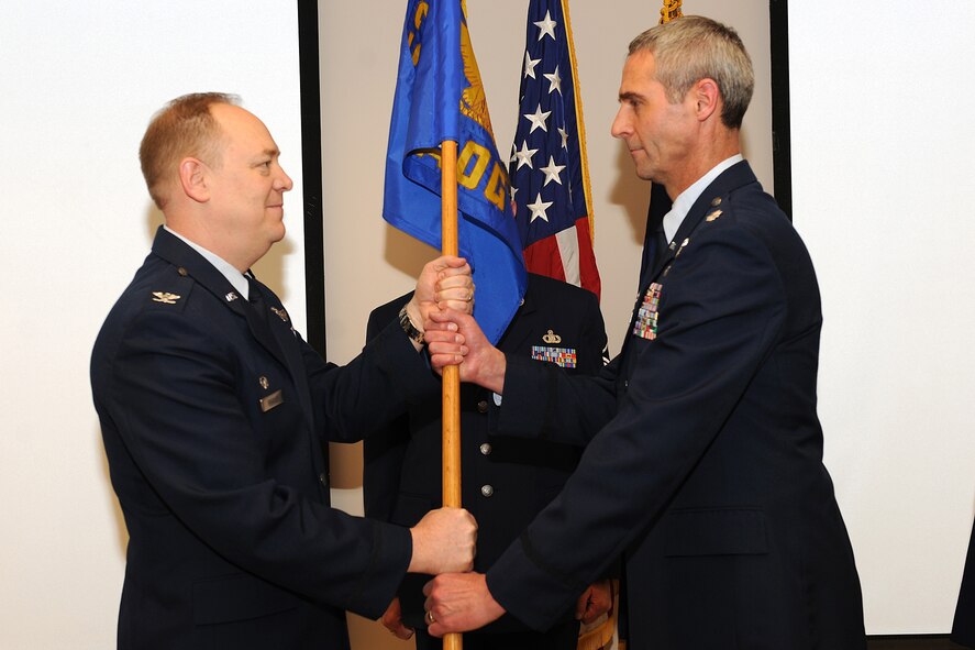 Incomming 152nd Air Operations Group Commander, Colonel (Sel.) Mark D. Murphy takes the 152AOG Guideon from 174th Fighter Wing Commander Colonel Kevin Bradley. Colonel (sel) Murphy took over 152AOG operations from outgoing Commander Colonel Kevin Brown during the April UTA.(US Air Force photo by Staff Sgt James N. Faso II/RELEASED)