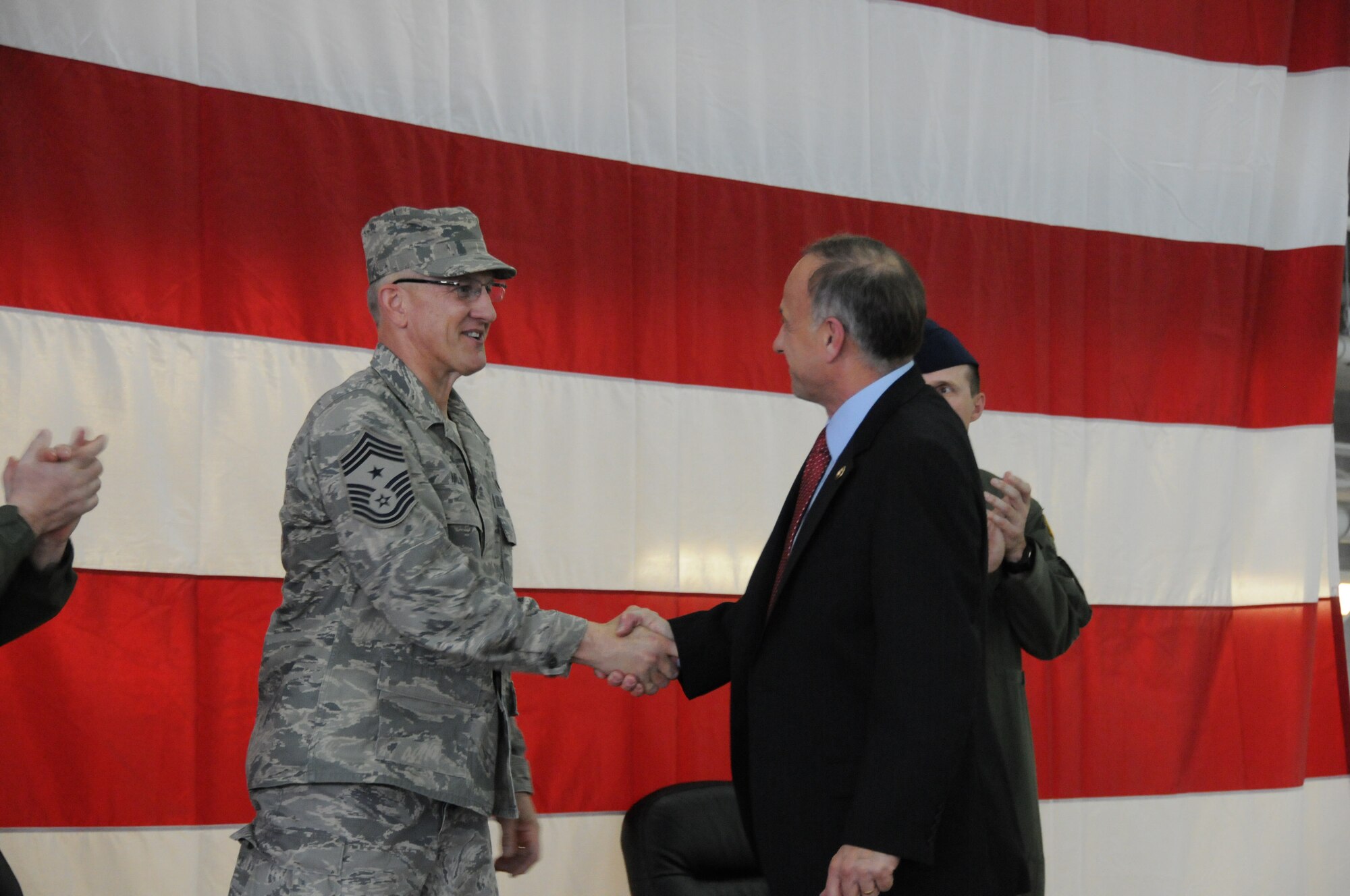 Congressman Steve King (R-IA) congratulates the new Command Chief, Chief Dave Miller at the official change of Command Chief Ceremony on Saturday, April 10, 2010.  
Air Force Photo by: Tech Sgt Oscar Sanchez
