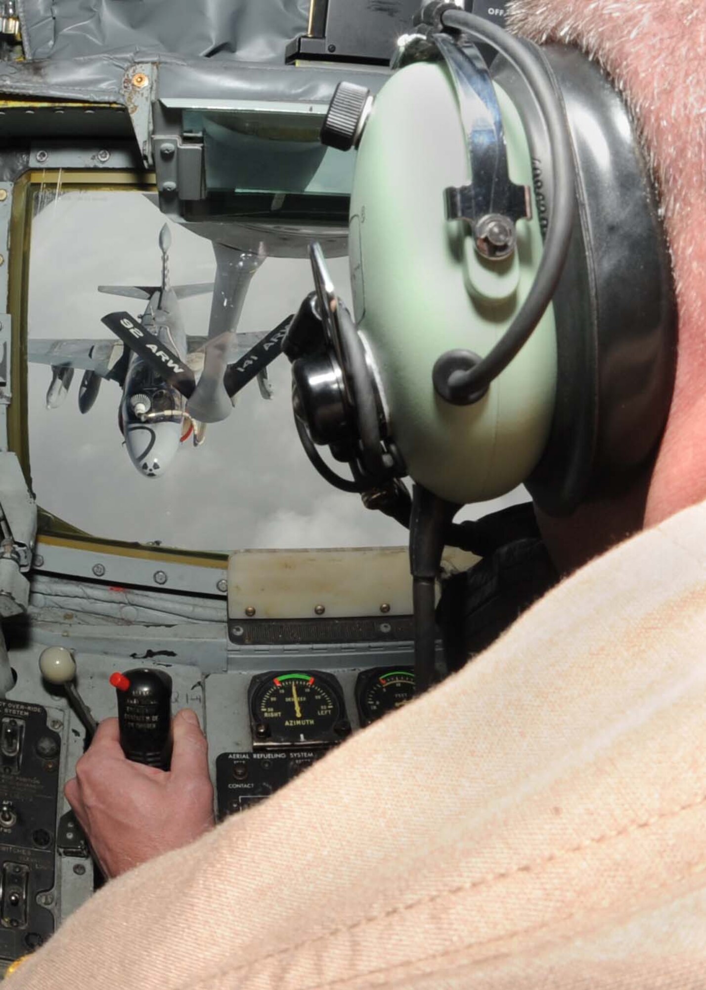 Senior Master Sgt. Todd Daniels, 22nd Expeditionary Air Refueling Squadron aerial refueler, off-loads fuel to a U.S. Navy EA-6B Prowler from the back of a KC-135 Stratotanker over Afghanistan April 10, 2010. The day of April 10 made 22nd EARS history when an air crew logged the 16,000th sortie. (U.S. Air Force photo/Senior Airman Nichelle Anderson/released)
