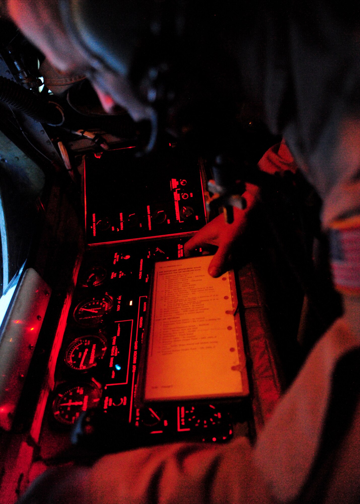 Senior Master Sgt. Todd Daniels, 22nd Expeditionary Air Refueling Squadron aerial refueler, operates the controls for the boom in the back of a KC-135 Stratotanker over Afghanistan April 10, 2010. The day of April 10 made 22nd EARS history when an air crew logged the 16,000th sortie. (U.S. Air Force photo/Senior Airman Nichelle Anderson/released)