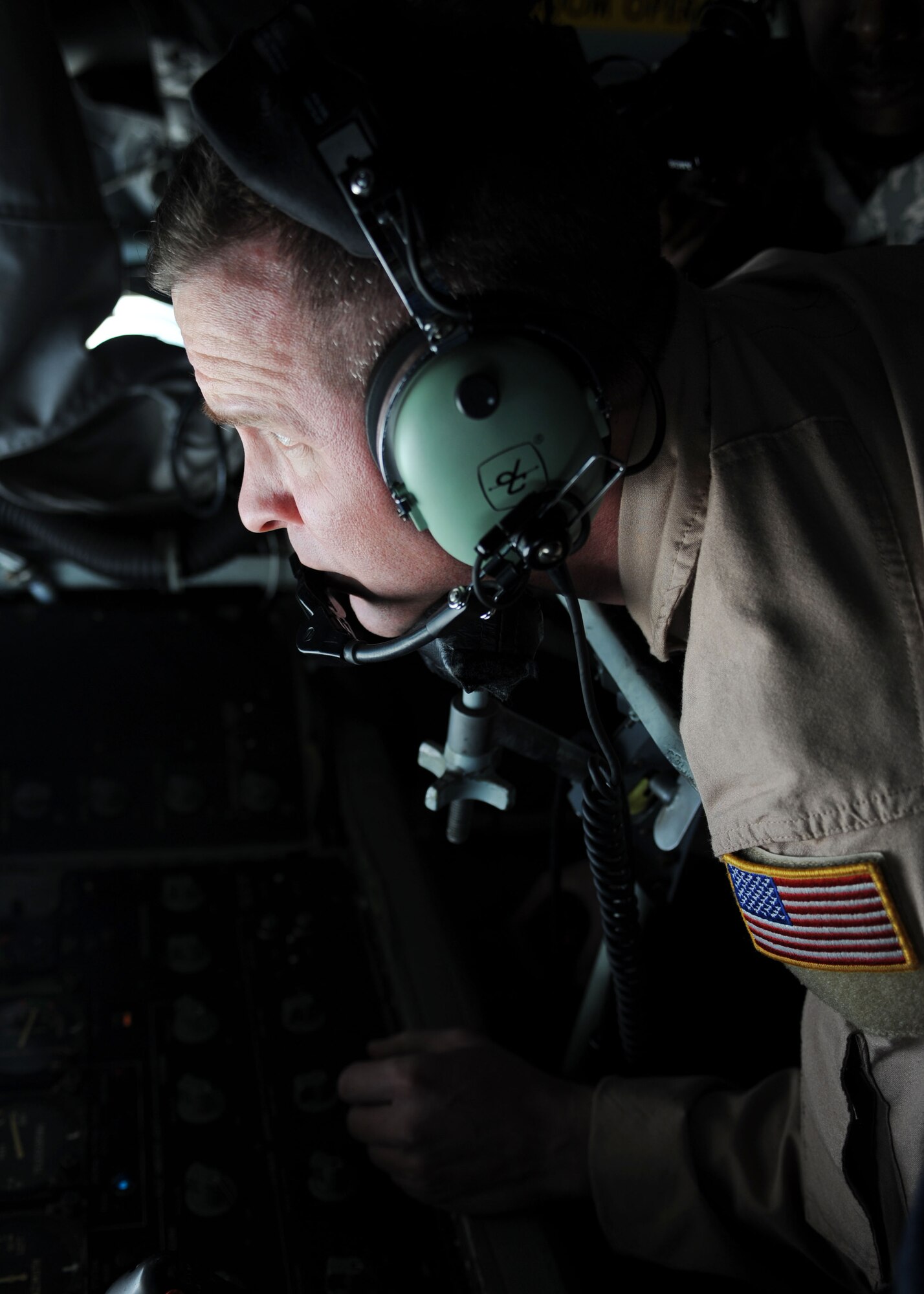 Senior Master Sgt. Todd Daniels, 22nd Expeditionary Air Refueling Squadron aerial refueler, off-loads fuel to a U.S. Navy EA-6B Prowler from the back of a KC-135 Stratotanker over Afghanistan April 10, 2010. The day of April 10 made 22nd EARS history when an air crew logged the 16,000th sortie. (U.S. Air Force photo/Senior Airman Nichelle Anderson/released)
