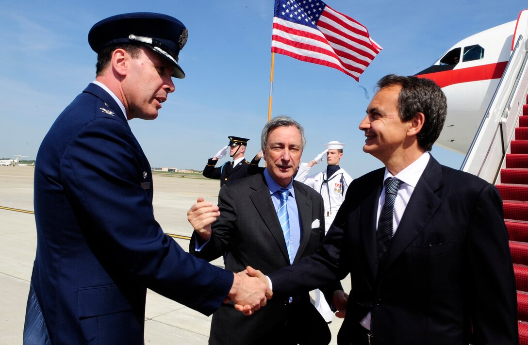 Jose Luis Rodriguez Zapatero, Prime Minister of Spain, is greeted by Col. Steven "Shep" Shepro, 316th Wing/Joint Base Andrews commander, on the flight line at Joint Base Andrews, Md., April 12, 2010. The national delegate landed at Andrews on his way to the Nuclear Security Summit hosted by President Barack Obama in Washington, D.C., which is slated for April 12 and 13. The 316th Wing is leading operations to provide safe, effective and efficient arrival and departure services for the invited guests transiting Andrews. (U.S. Air Force photo by Staff Sgt. Keyonna Fennell)