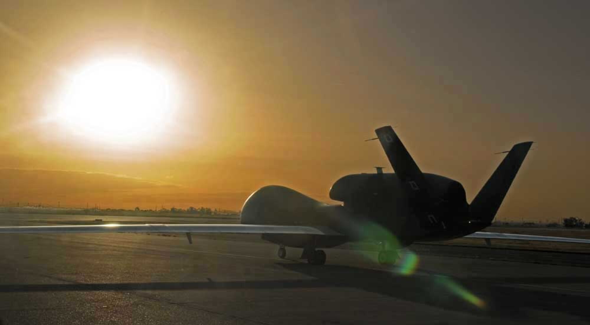 An RQ-4 Global Hawk taxis down the runway at Beale Air Force Base, Calif., April 8, 2010, on an operational mission.  During the flight, the aircraft flew over Canadian airspace for the first time in non-training status. (U.S. Air Force photo/Airman 1st Class David Tracy)