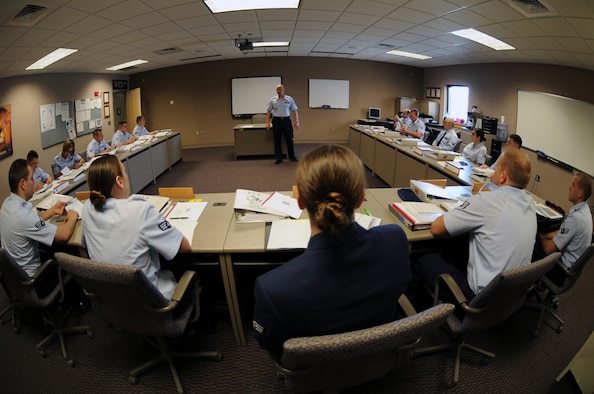 WHITEMAN AIR FORCE BASE, Mo. - Tech. Sgt. Joseph Laxson, 509th Force Support Squadron, Airman Leadership School (ALS) instructor briefs his flight on the upcoming 5 weeks of curriculum April 9, 2010.  (U.S. Air Force photo/Staff Sgt. Jason Huddleston)  (Released)