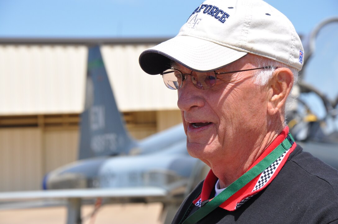 An F-105 pilot from the 469th Tactical Fighter Squadron, retired Col. Tom Norris, shares his story of being shot down and held as a prisoner of war in Vietnam during the 469th TFS reunion here Friday. (U.S. Air Force photo/1st Lt. Brittany Martin)