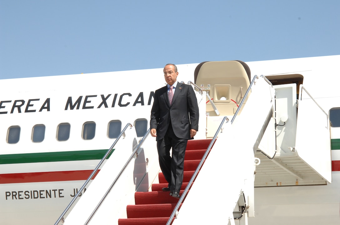 President of Mexico, Felipe Calderon, arrives at Joint Base Andrews, Md., April 12, 2010. The national delegate landed at Andrews on his way to the Nuclear Security Summit hosted by President Barack Obama in Washington, D.C., which is slated for Monday and Tuesday. The 316th Wing is leading operations to provide safe, effective and efficient arrival and departure services for the invited guests transiting Andrews. (U.S. Air Force photo by Tech. Sgt. Maritza Freeland).