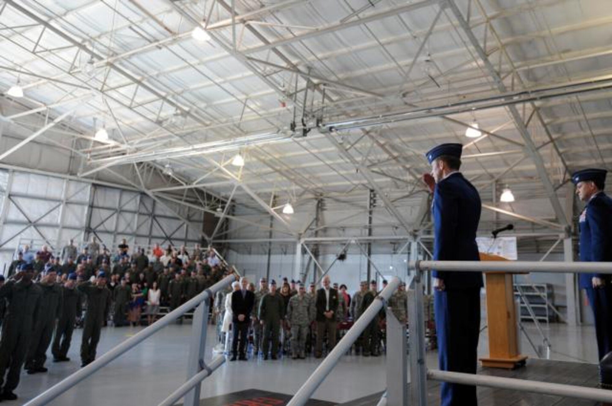 Lieutenant Col. Justin Hoffman salutes the Airmen of the newly activated 34th Special Operations Squadron after assuming command April 9, 2010. During the ceremony the 1st Special Operations Group reactivated and redesignated the 34th Troop Carrier Squadron as the 34th Special Operations Squadron and Colonel Justin Hoffman was named commander, continuing a legacy that began more than 65 years ago. (U.S. Air Force photo by Senior Airman Matthew Loken)
