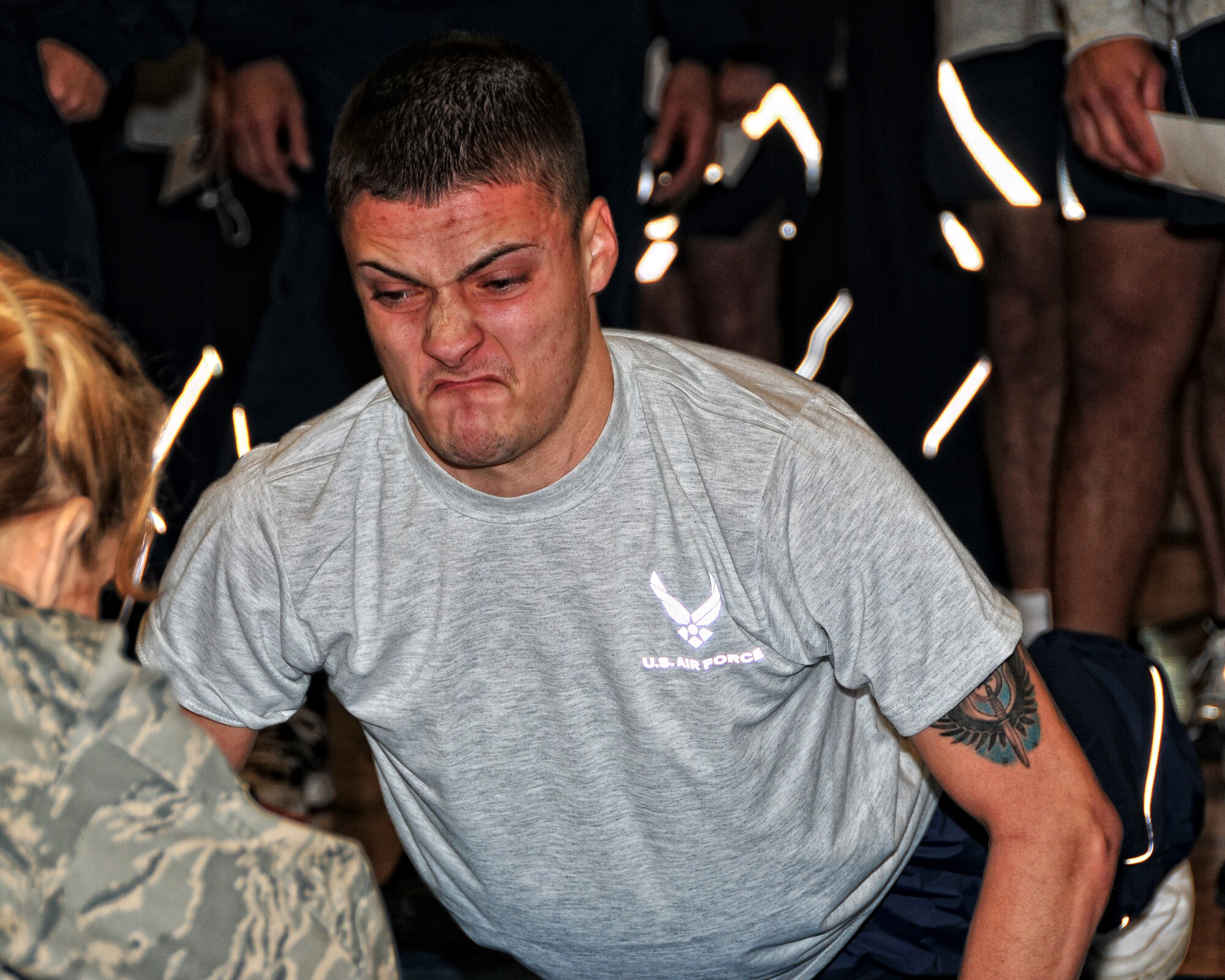 Senior Airman Jose Rivera of the 914th Airlift Wings electric shop participates in the first bi-annual Air Force physical fitness test, April 11, 2010, Niagara Falls Air Reserve Station, Niagara Falls NY. The physical fitness test has been modified as part of the new Air Force Fit to Fight program. (U.S. Air Force photo by Staff Sgt. Joseph McKee)