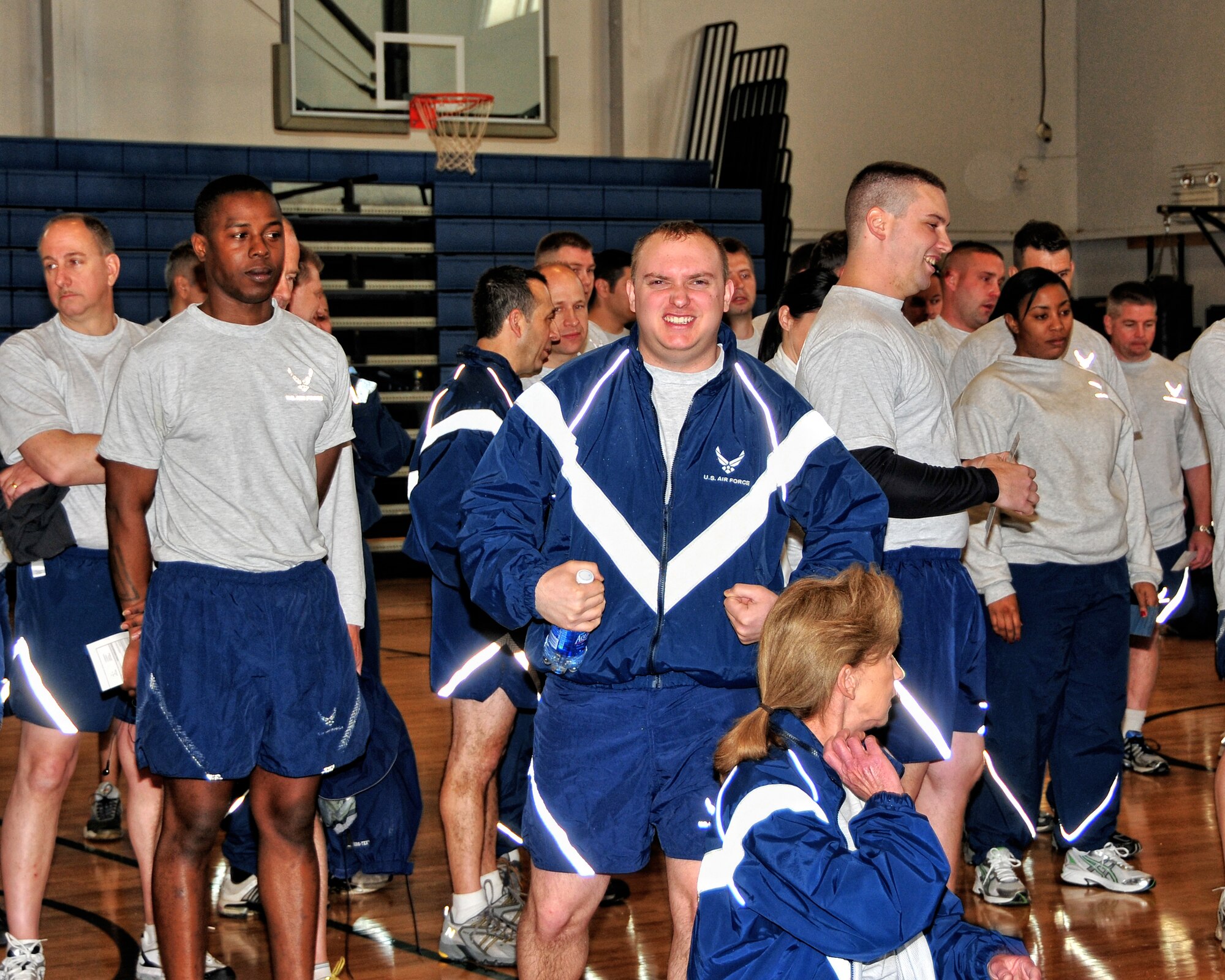 Members of the 914th Airlift Wing participate in the first bi-annual Air Force physical fitness test, April 11, 2010, Niagara Falls Air Reserve Station, Niagara Falls NY. The physical fitness test has been modified as part of the new Air Force Fit to Fight program The new changes are some of the most significant the Air Force has implemented in the last five years. These changes include the test being held twice a year and more focus on aerobic fitness.  As added incentive Air Force members scoring 90 and above and meeting all component minimum requirement are authorized to wear a patch on their right sleeve of their PT uniform. (U.S. Air Force photo by Staff Sgt. Joseph McKee)