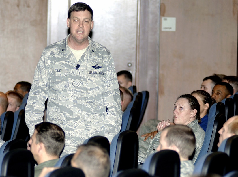 U.S. Air Force Brig. Gen. Bradley Pray briefs members of Joint Base Charleston regarding the Force Management Program at the base theater here during his recent visit April 8, 2010. The FMP will balance Air Force career fields which are overmanned and provide more personnel to other career fields which are critically manned and stressed. General Pray is the Air Mobility Command deputy director of operations. (U.S. Air Force photo/Staff Sgt. Marie Brown)