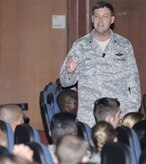 U.S. Air Force Brig. Gen. Bradley Pray briefs members of Joint Base Charleston regarding the Force Management Program at the base theater here during his recent visit April 8, 2010. The FMP is designed to reduce the size and shape of the Air Force to meet current and future mission requirements. Currently, the Air Force has more Airmen than congressionally authorized due to some of the highest retention rates in 15 years. General Pray is the Air Mobility Command deputy director of operations. (U.S. Air Force photo/Staff Sgt. Marie Brown)