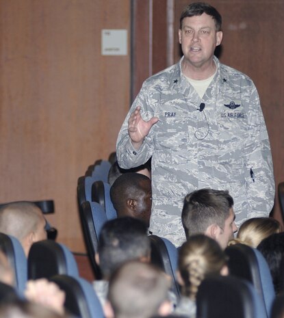 U.S. Air Force Brig. Gen. Bradley Pray briefs members of Joint Base Charleston regarding the Force Management Program at the base theater here during his recent visit April 8, 2010. The FMP is designed to reduce the size and shape of the Air Force to meet current and future mission requirements. Currently, the Air Force has more Airmen than congressionally authorized due to some of the highest retention rates in 15 years. General Pray is the Air Mobility Command deputy director of operations. (U.S. Air Force photo/Staff Sgt. Marie Brown)