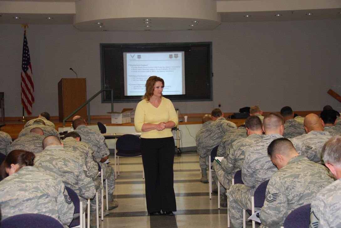 JOINT BASE MCGUIRE-DIX-LAKEHURST, N.J. - Judith Pates, director of the Airmen and Family Readiness Center, gives a family readiness briefing April 6 as part of a Reseve mobilization inprocessing. Close to 100 Citizen Airmen stationed here came on active duty orders as a result of the C-17 surge supporting the increase in troops in Afghanistan. (U.S. Air Force photo/Master Sgt. Donna T. Jeffries)
