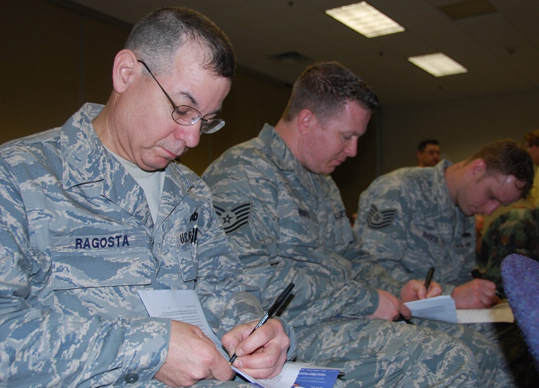 JOINT BASE MCGUIRE-DIX-LAKEHURST, N.J. - Master Sgt. Patrick Ragosta, an aircraft maintenance specialist, completes paperwork April 6 as part of the mobilization inprocessing process.Close to 100 Citizen Airmen stationed here came on active duty orders as a result of the C-17 surge supporting the increase in troops in Afghanistan. (U.S. Air Force photo/Master Sgt. Donna T. Jeffries)