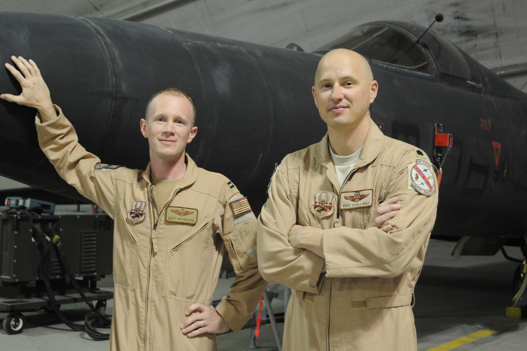 Recently, the U.S. Air Force has awoken a dragon to attack the danger of counterinsurgency or COIN operations from the sky by changing its angle of attack -- getting lower for a closer look. Pictured right on April 2, 2010, Lt. Col. Kirt Stallings, commander, 99th Expeditionary Reconnaissance Squadron at a non-disclosed base in Southwest Asia, piloted a U.S. Air Force U-2 Dragon Lady intelligence, surveillenance and reconnaissance aircraf, like the one shown here, historically low over Afghanistan March 30, 2010, while Capt. Matt Nussbaum, shown left, U-2 pilot, is leading the effort to squeeze every drop of usefulness out of every image the U-2 Dragon Lady aircraft snaps as missions are flown from the 380th Air Expeditionary Wing. (U.S. Air Force Photo/SrA Jenifer H. Calhoun/Released)
