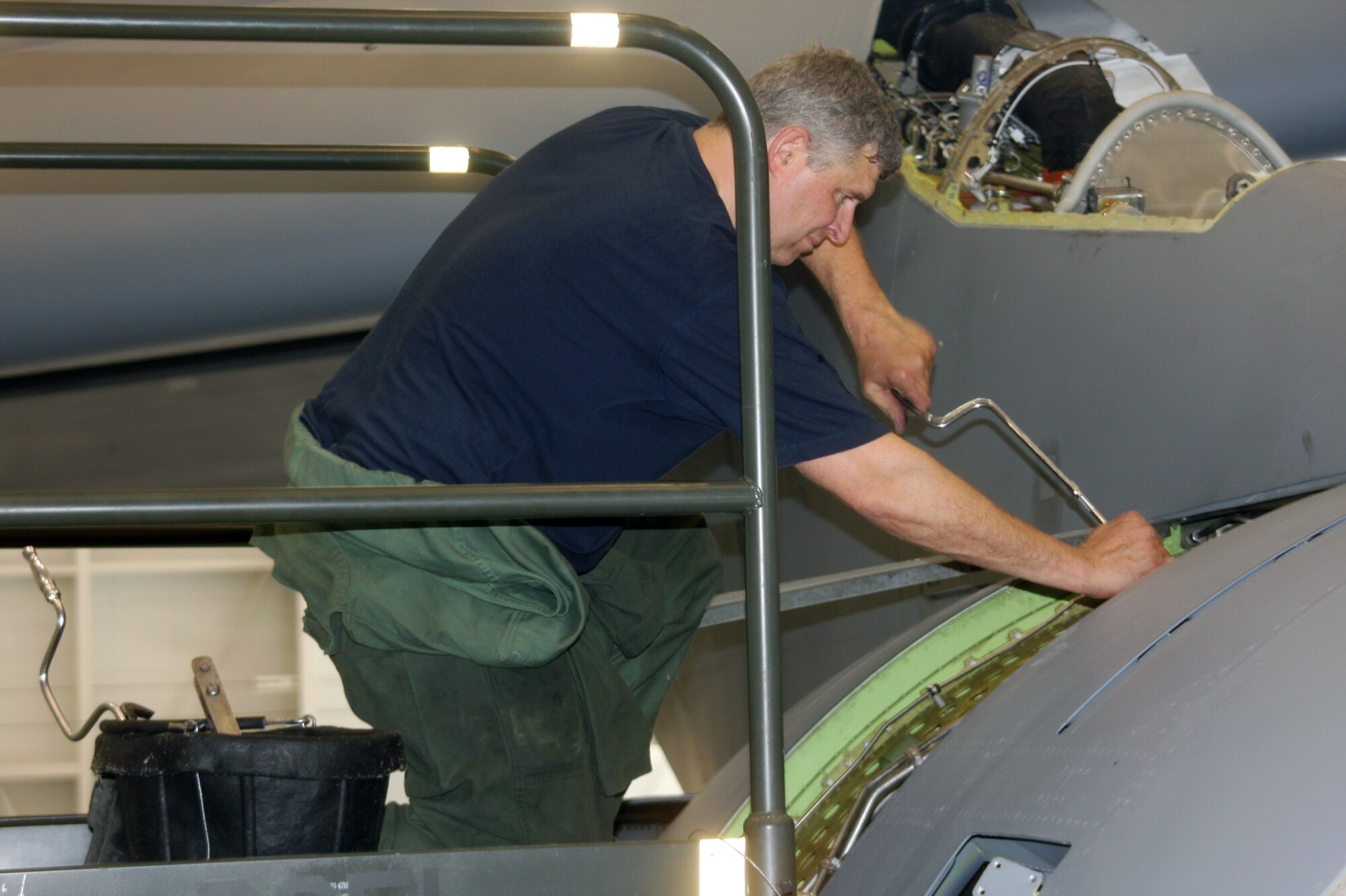 WRIGHT-PATTERSON AIR FORCE BASE, Ohio – Tech. Sgt. Eric Hobbs, 445th Maintenance Squadron, changes an inlet cowl on a C-5 Galaxy during an isochronal Inspection March 28.  During ISO inspections, aircraft maintainers look for and repair problems in every system, from nose to tail and wingtip to wingtip. (U.S. Air Force photo/Senior Airman Mikhail Berlin)