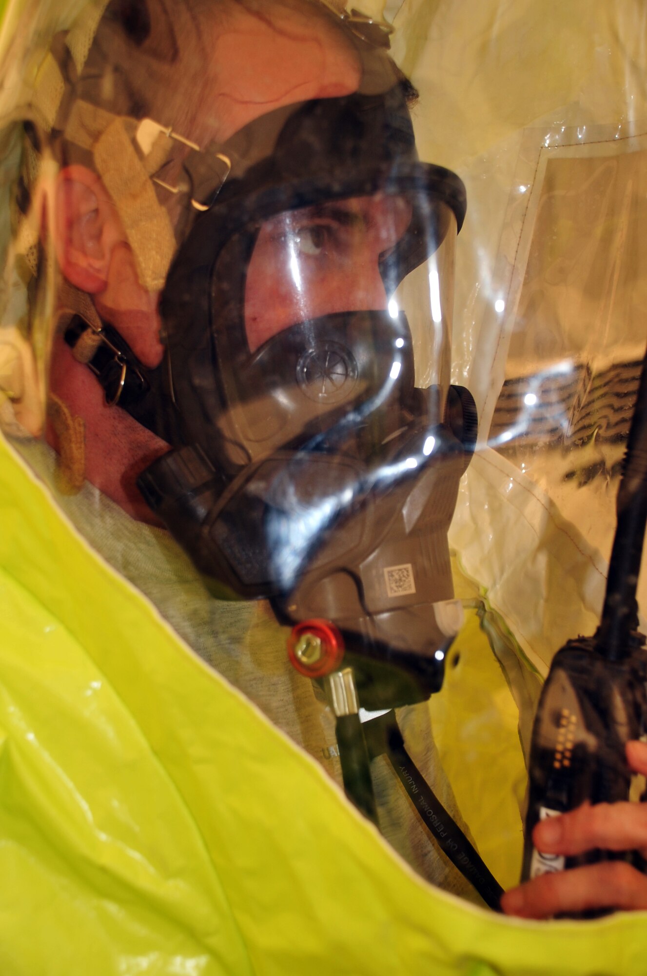 Senior Airman David Kandziolka, emergency management journeyman with the 380th Expeditionary Civil Engineer Squadron emergency management flight, participates in a co-agency training exercise with the 380th Expeditionary Medical Group bioenvironmental engineering section April 9, 2010, at a non-disclosed base in Southwest Asia. The exercise helped maintain readiness and cooperation between agencies for events such as a hazardous material response. Airman Kandziolka is deployed from the 366th Civil Engineer Squadron at Mountain Home Air Force Base, Idaho, and his hometown is Nashville, Tenn. (U.S. Air Force Photo/Master Sgt. Scott T. Sturkol/Released)