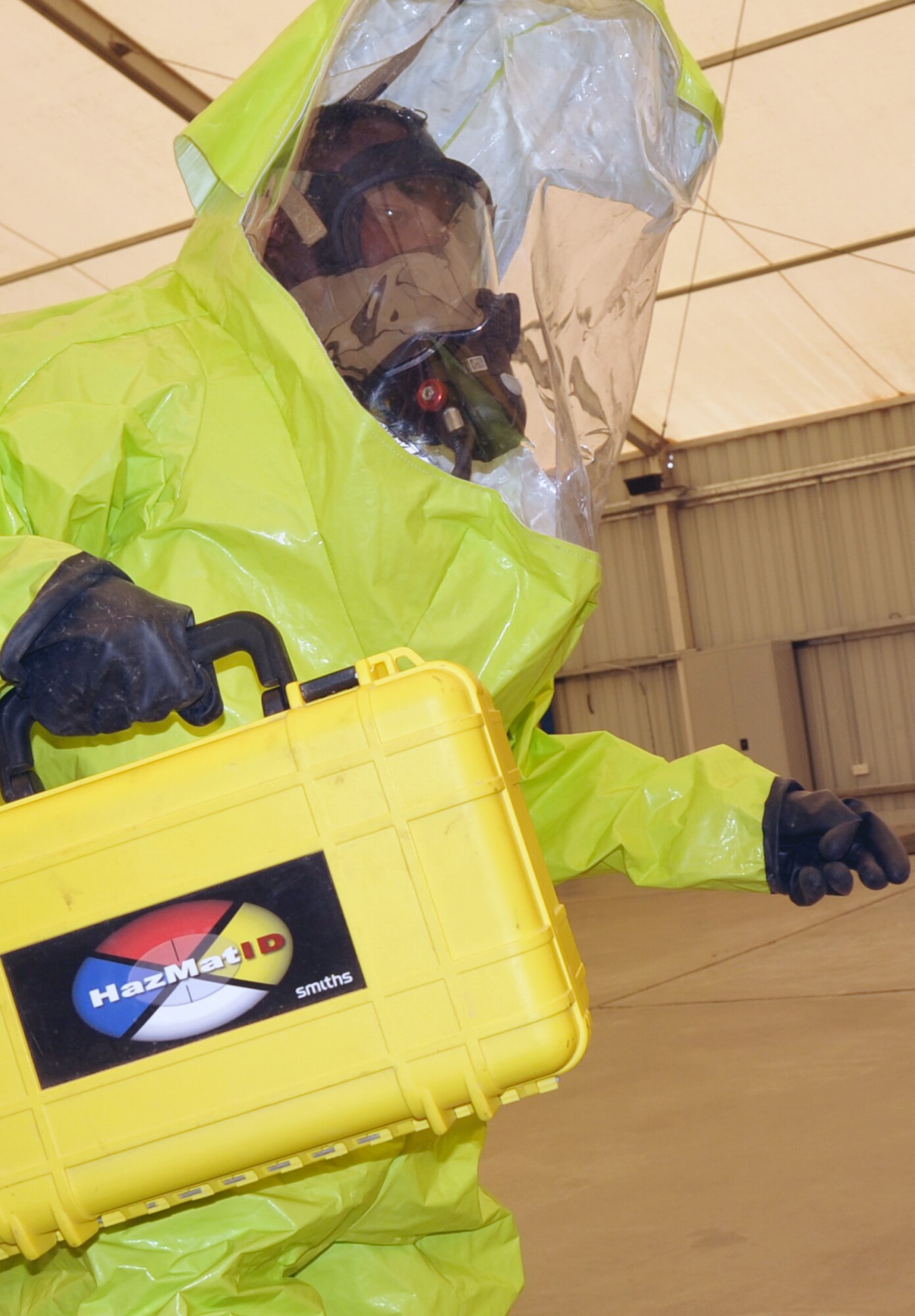 Staff Sgt. Sterling McClendon, bioenvironmental engineering journeyman with the 380th Expeditionary Medical Group bioenvironmental engineering section, participates in a co-agency training exercise with the 380th Expeditionary Civil Engineer Squadron emergency management flight April 9, 2010, at a non-disclosed base in Southwest Asia. The exercise helped maintain readiness and cooperation between agencies for events such as a hazardous material response. Sergeant McClendon is deployed from the 81st Medical Group at Keesler Air Force Base, Miss., and his hometown is El Paso, Texas. (U.S. Air Force Photo/Master Sgt. Scott T. Sturkol/Released)