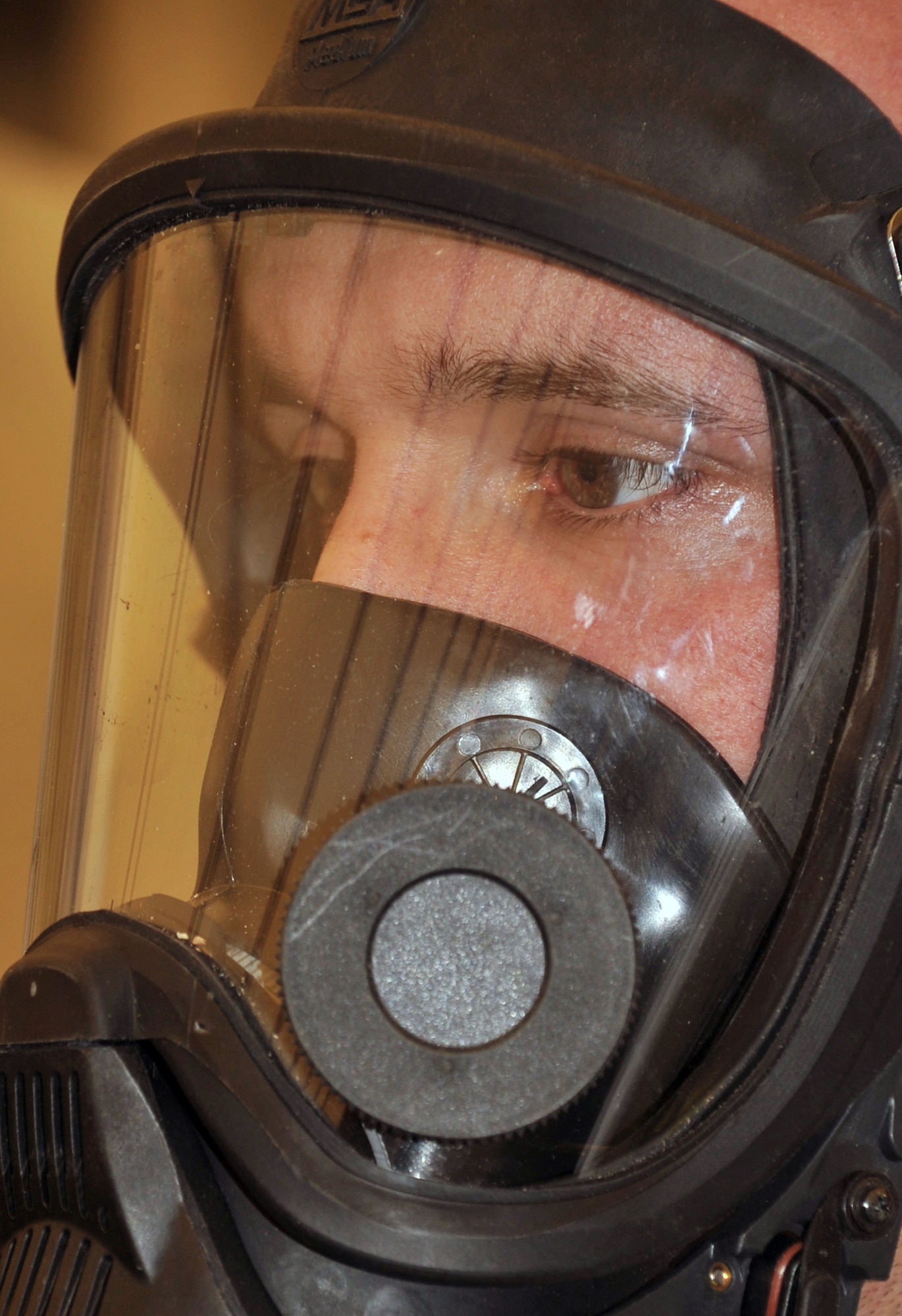 Senior Airman David Kandziolka, emergency management journeyman with the 380th Expeditionary Civil Engineer Squadron emergency management flight, participates in a co-agency training exercise with the 380th Expeditionary Medical Group bioenvironmental engineering section April 9, 2010, at a non-disclosed base in Southwest Asia. The exercise helped maintain readiness and cooperation between agencies for events such as a hazardous material response. Airman Kandziolka is deployed from the 366th Civil Engineer Squadron at Mountain Home Air Force Base, Idaho, and his hometown is Nashville, Tenn. (U.S. Air Force Photo/Master Sgt. Scott T. Sturkol/Released)